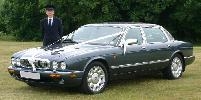 Left side of car with chauffeur